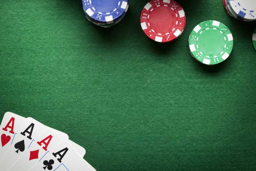poker table with cards and chips