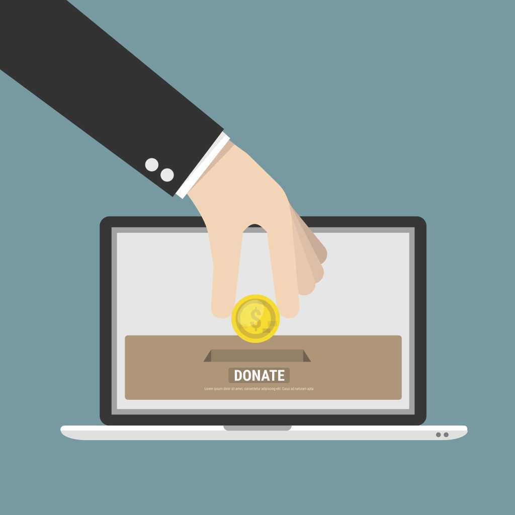 Man adding coin to web page on laptop