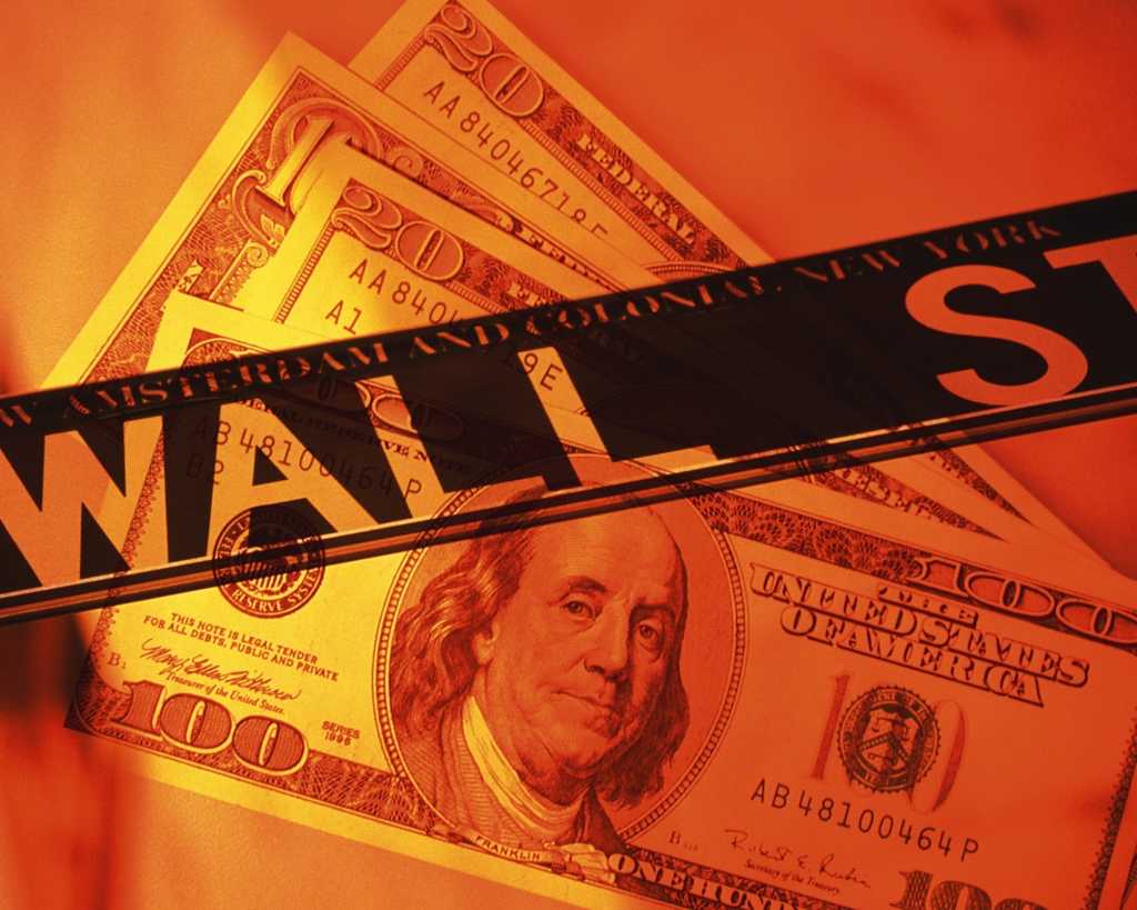 abstract collage of money with wall street finance