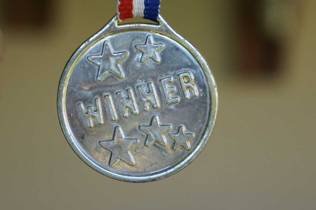 winner medal contest victory
