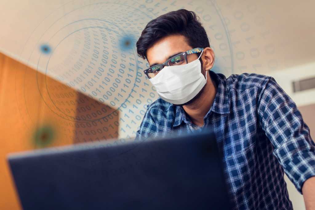 young man on video conference coronavirus remote communication telecommuting by gcshutter getty ima