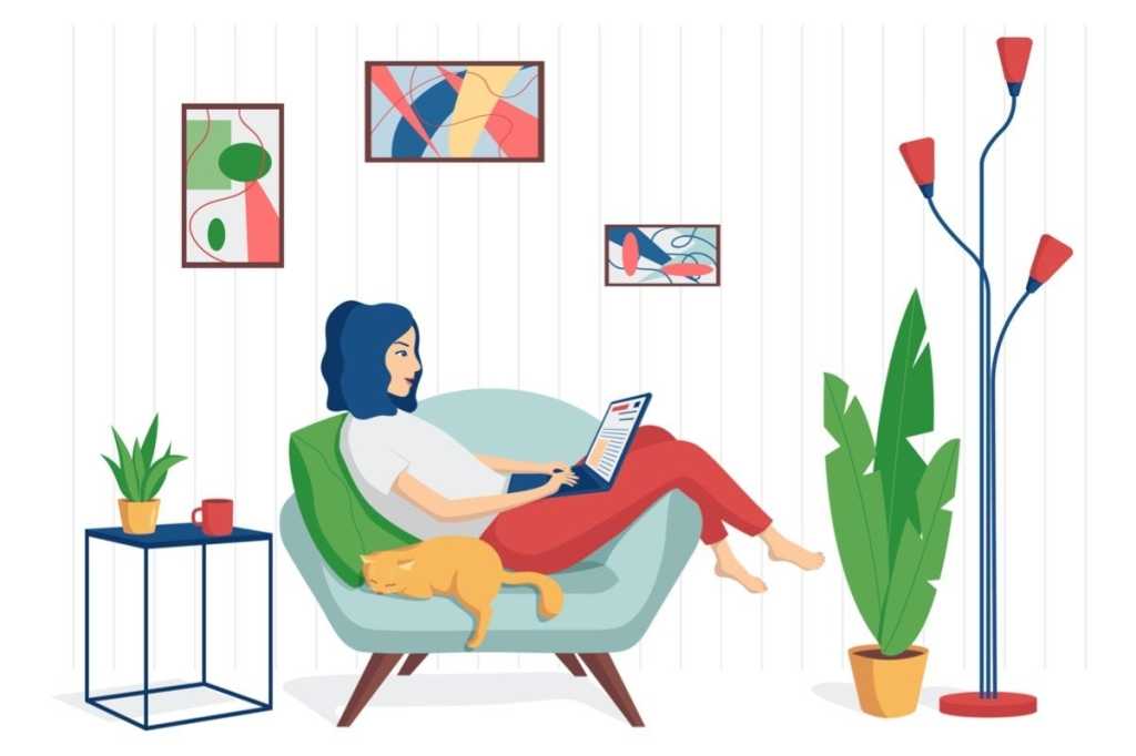 young woman in home clothes is sitting in a chair with a laptopthe vector id1221318969