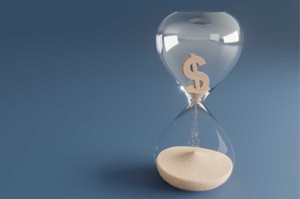 hourglass dollar sign