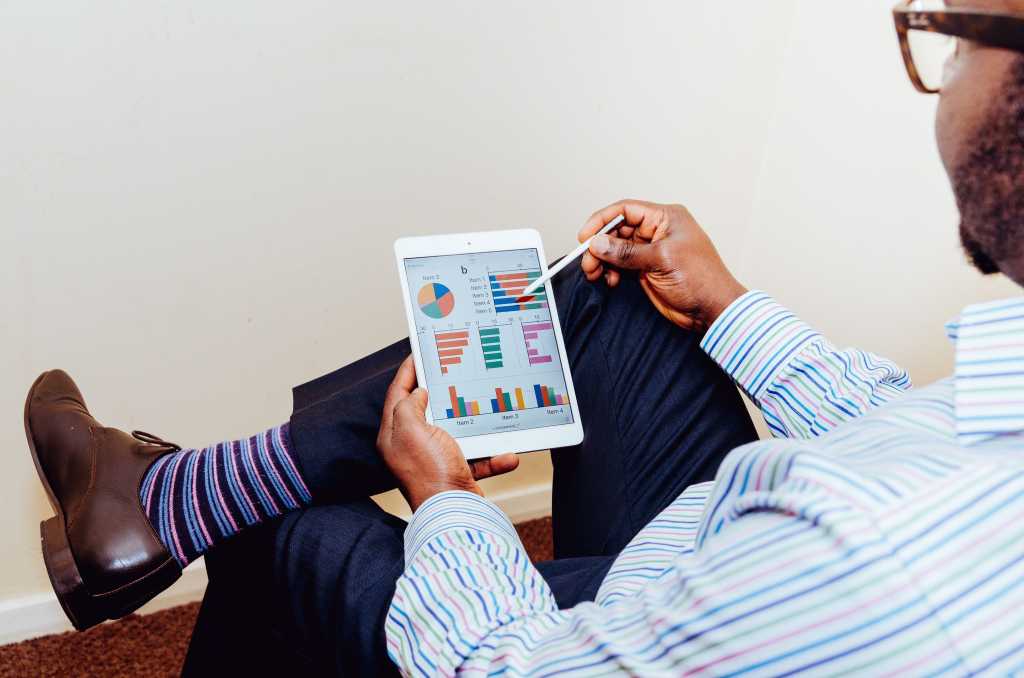 businessman tablet mobile collaboration tools dashboard [Olu Eletu - CC0 via Unsplash]