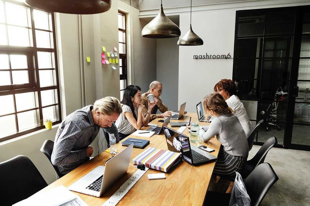 teamwork / collaboration / group meeting in conference room