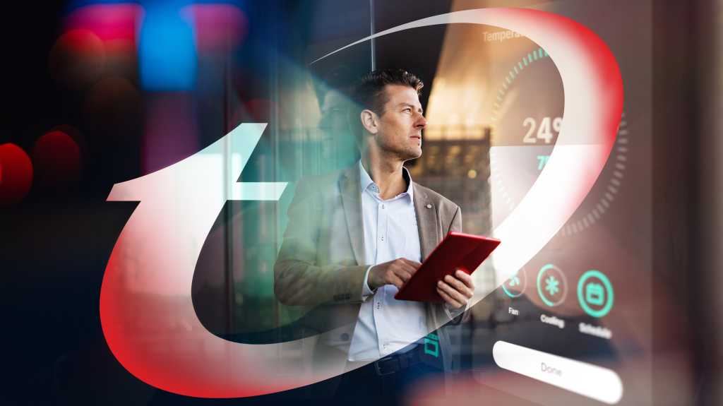 Trend Micro image of man in suit jacket and electronic device in hand