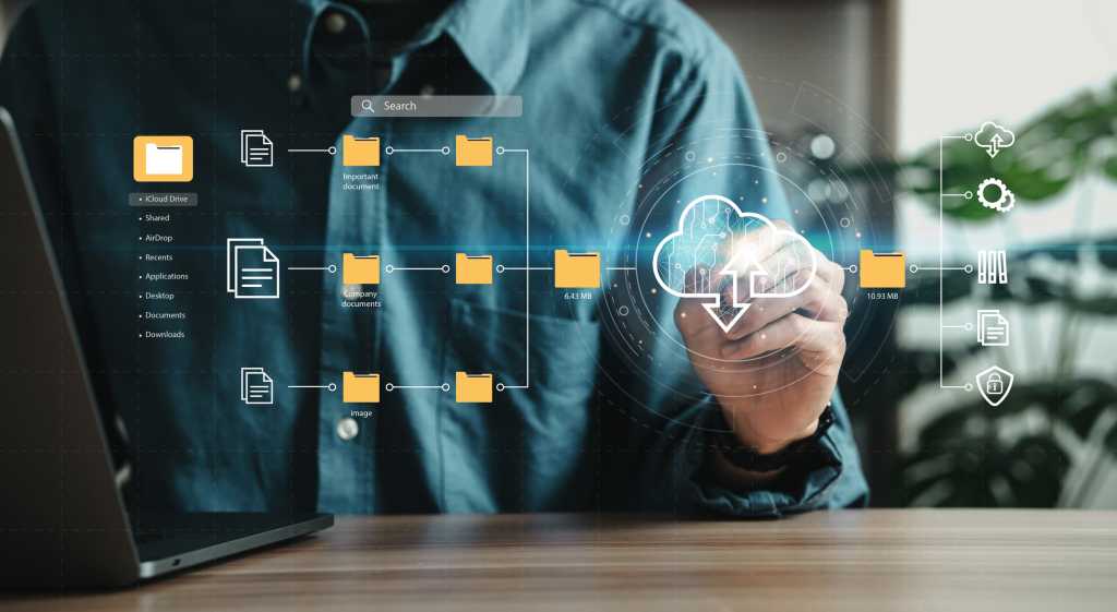 Man using laptop showing cloud computing diagrams digital technology information exchange and future technology ideas Data Document Management System (DMS) Network and Internet Service Concept
