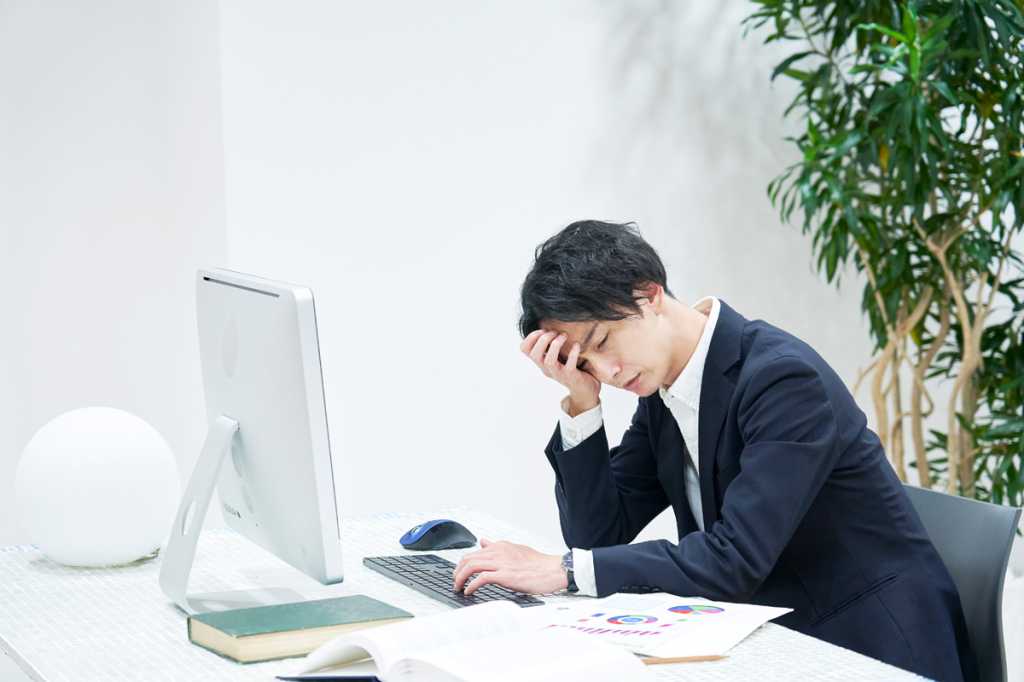 Japan Asia frustrated tired busy office worker man presentation