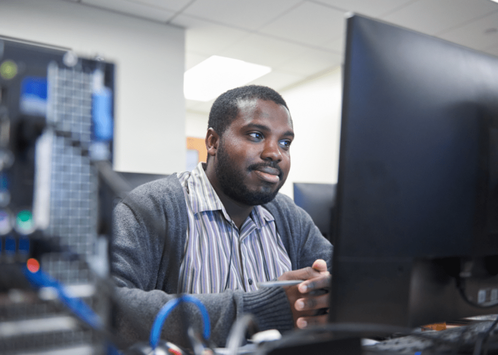 Per Scholas community member learning IT skills