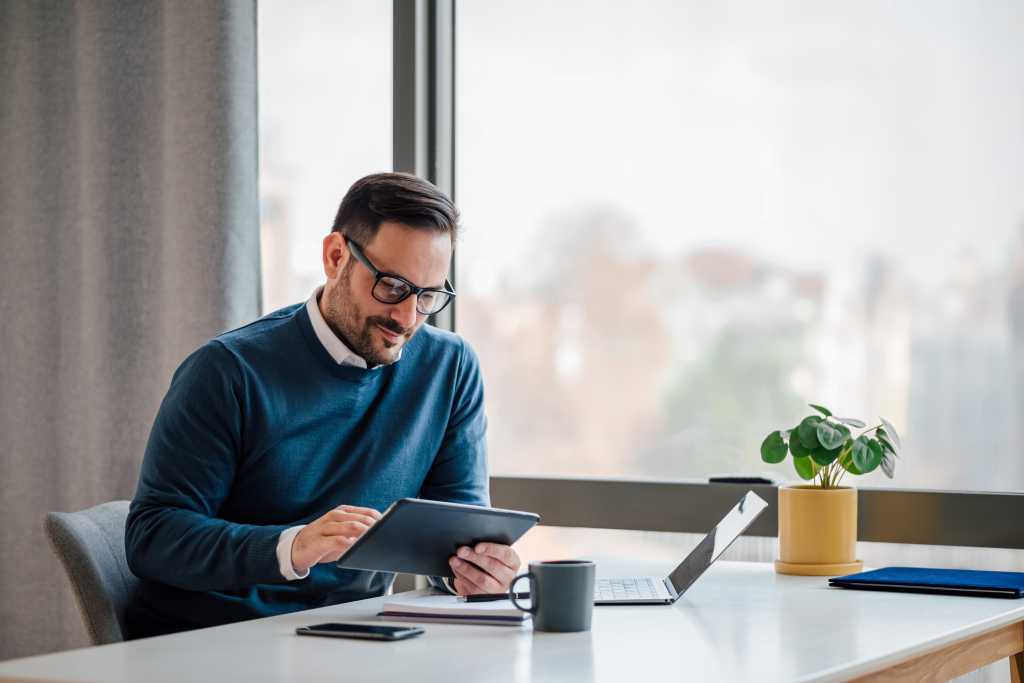 Executive on tablet