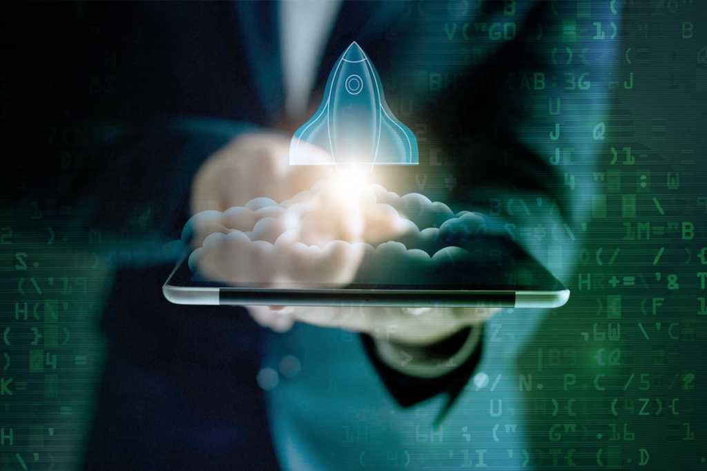 cybersecurity startup tablet with rocket lifting off startup