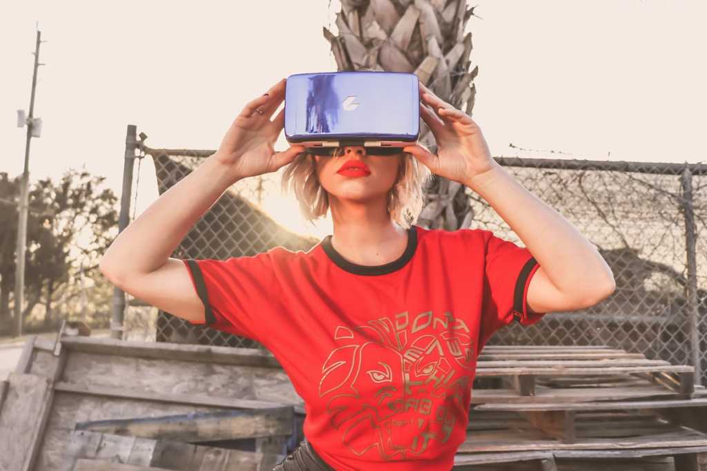 young woman with virtual reality headset glasses augmented reality by tim savage