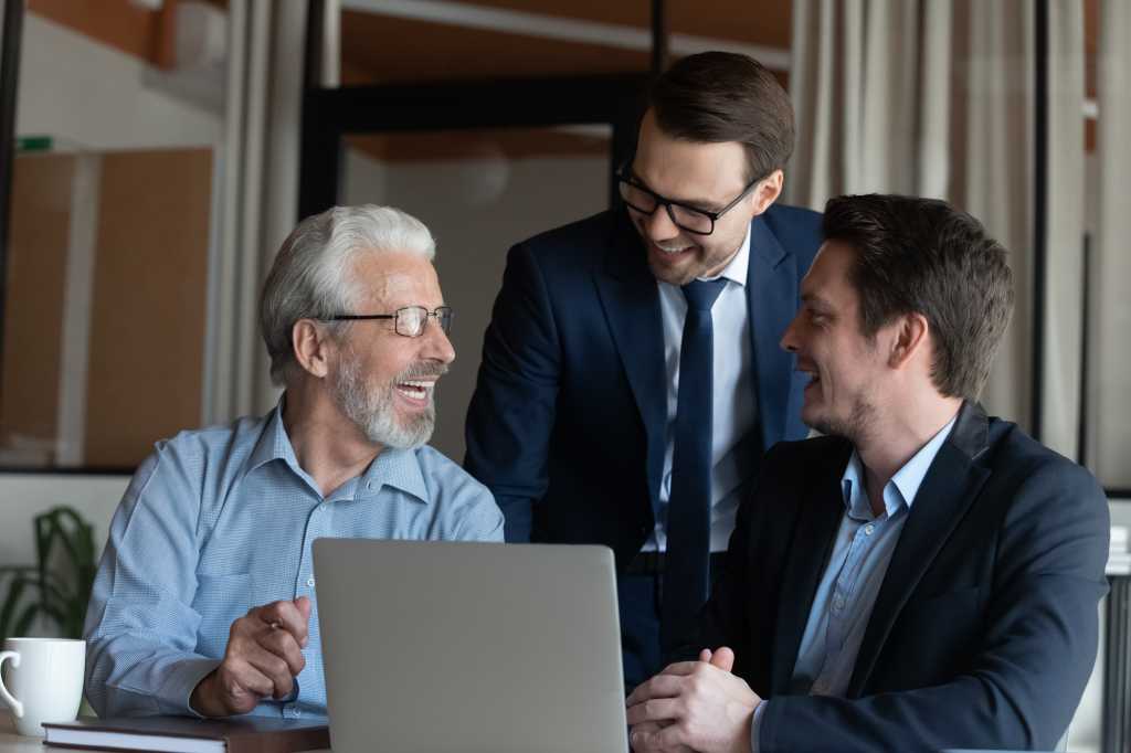 business men meeting office laptop