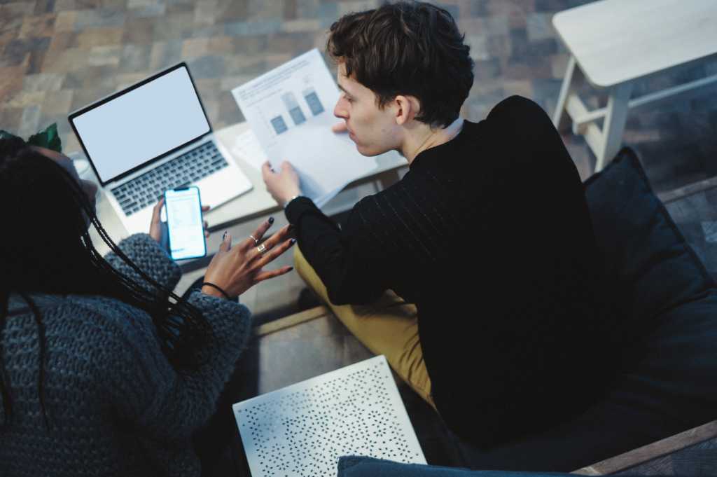 Young couple brainstorming their finances, savings and investments