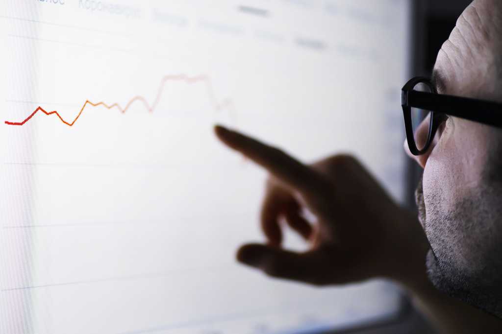 person looking at data on screen