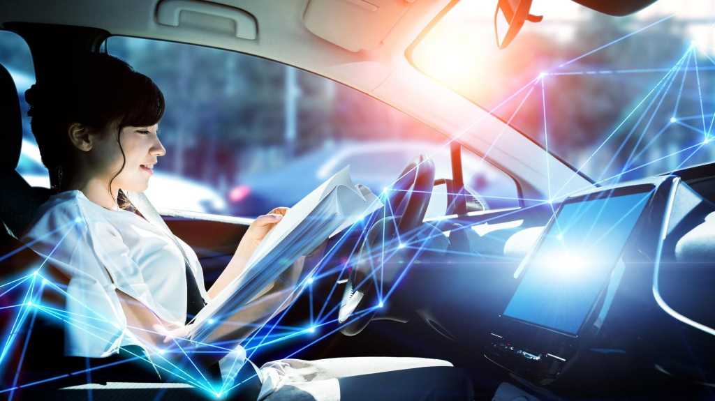 Interior of autonomous car. Driverless vehicle. Self driving. UGV. Advanced driver assistant system.