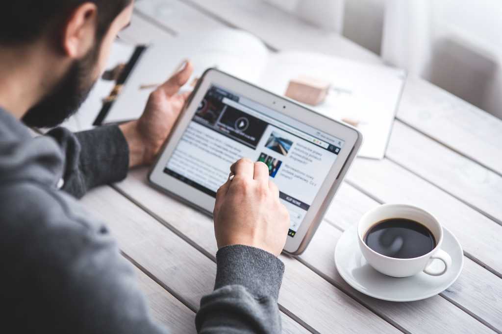 man with laptop coffee