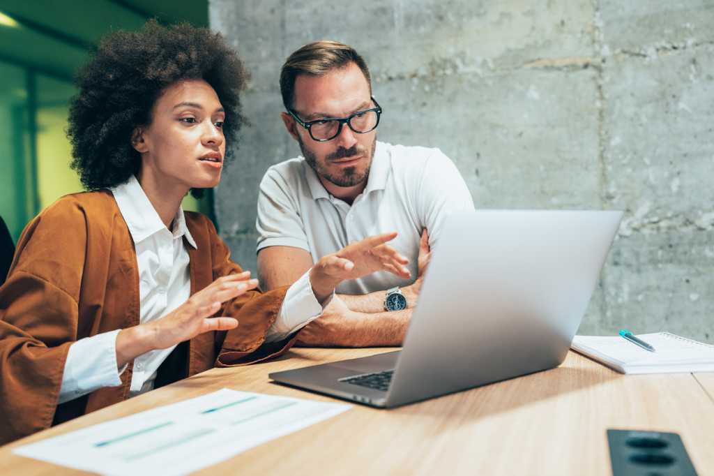 man and woman computer
