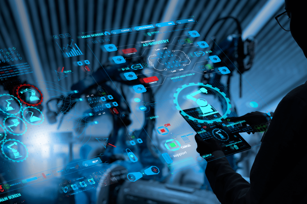 Factory Female Industrial Engineer working with automation robot arms machine in intelligent factory industrial on real time monitoring system software.Digital future manufacture.