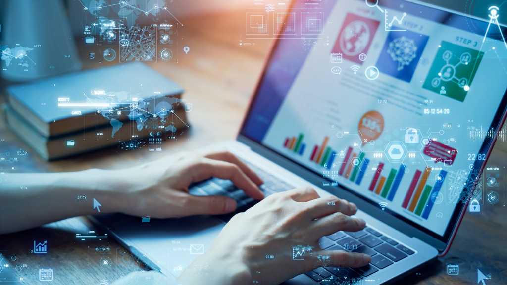Women using PCs and digital data. DX. ICT.