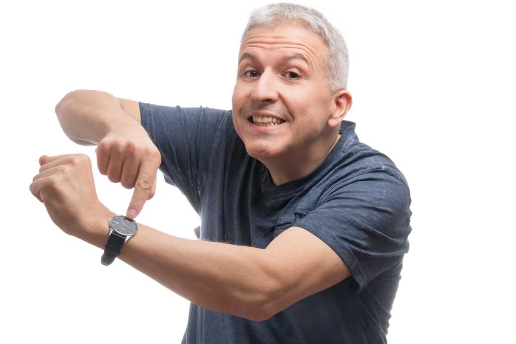 Deadline pressure, man points to clock