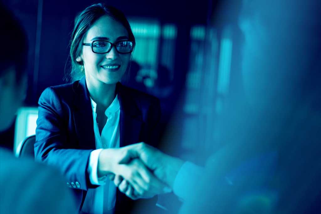 Tech Spotlight   >   IT Leadership [CSO]   >   A woman shakes hands with another.
