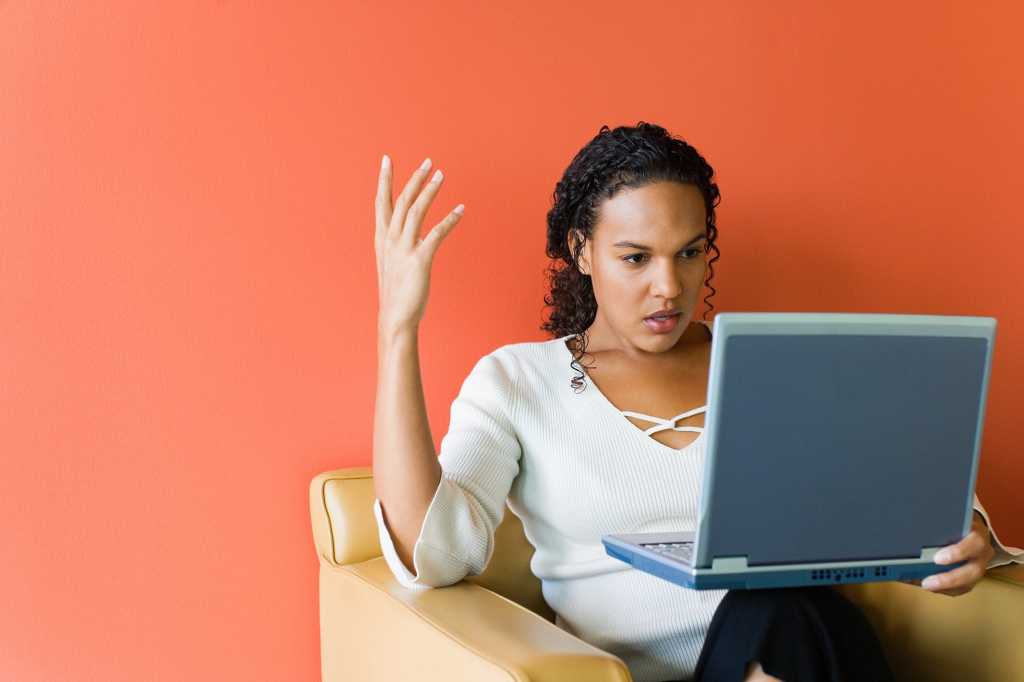 computer frustration woman orange