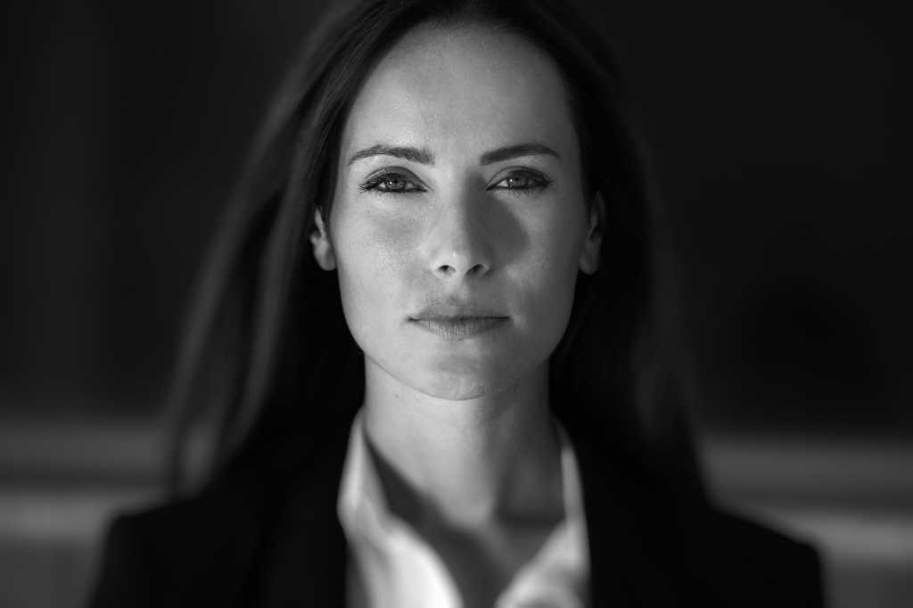 woman black and white executive pensive serious
