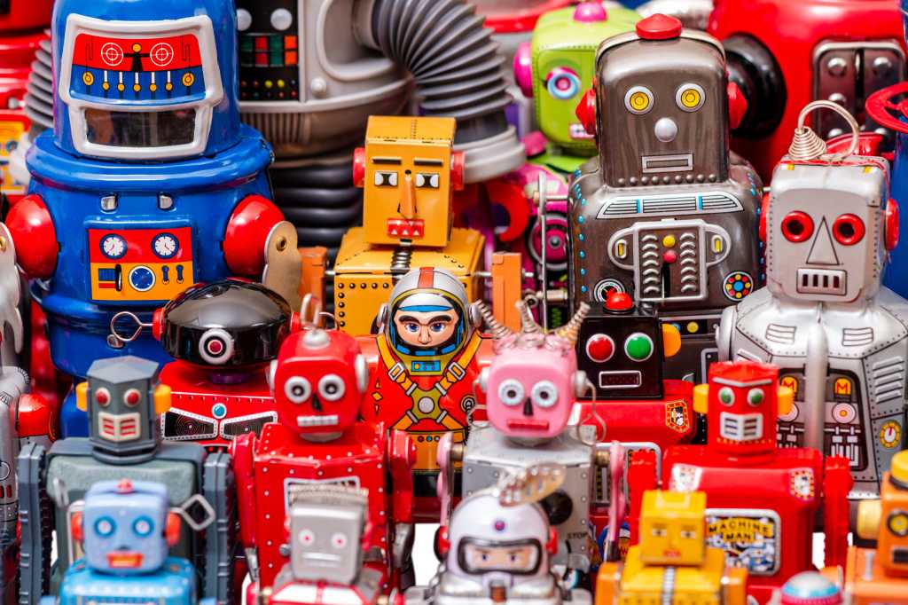 shutterstock 1735661867 colorful collection of vintage tin toy robots