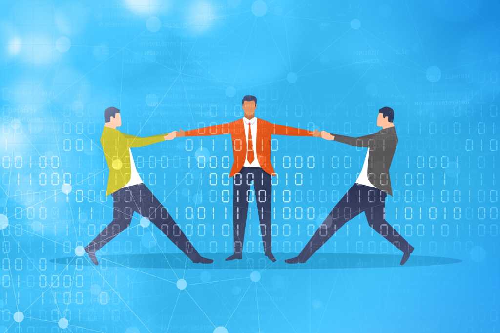 Demand for talent > Two business people compete for a third in a tug of war