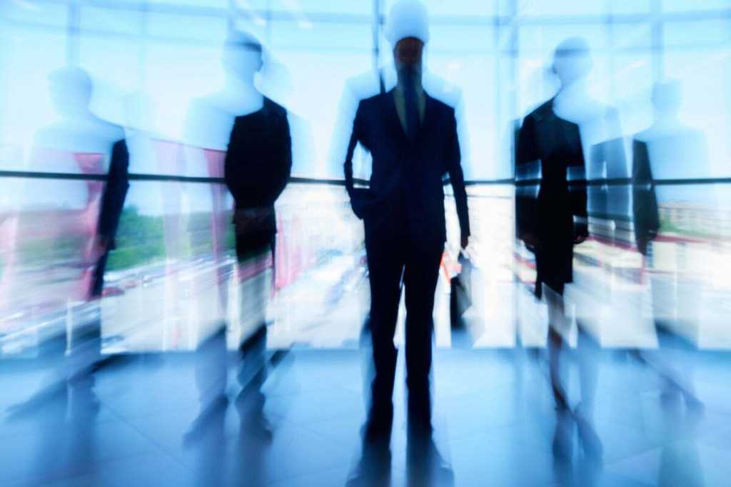 leaders executives in a row blurry