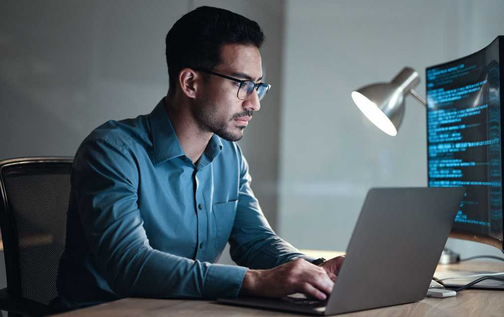 Laptop, screen and business man for coding, software development and programming script