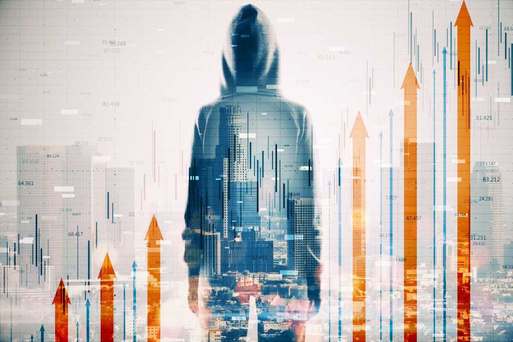 A hacker looks out over a city amid graphs of increasing trend lines and numerical rates.