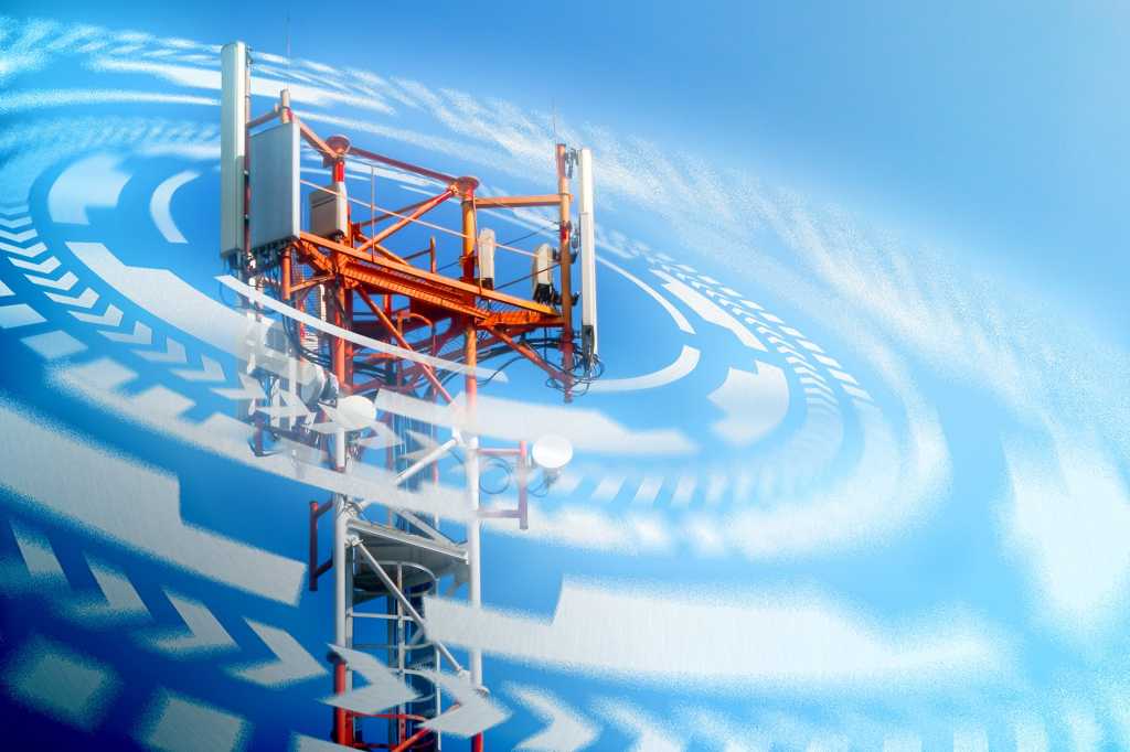 Wireless telecommunications tower encircled by concentric, virtual rings.