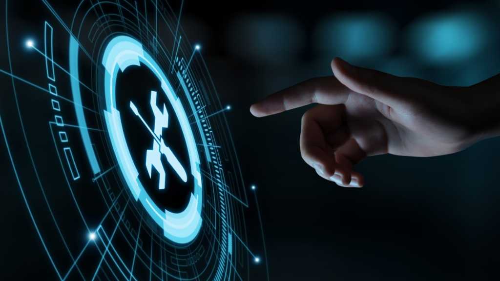 A hand reaching out to a hologram displaying an icon of a screwdriver crossed over a wrench.