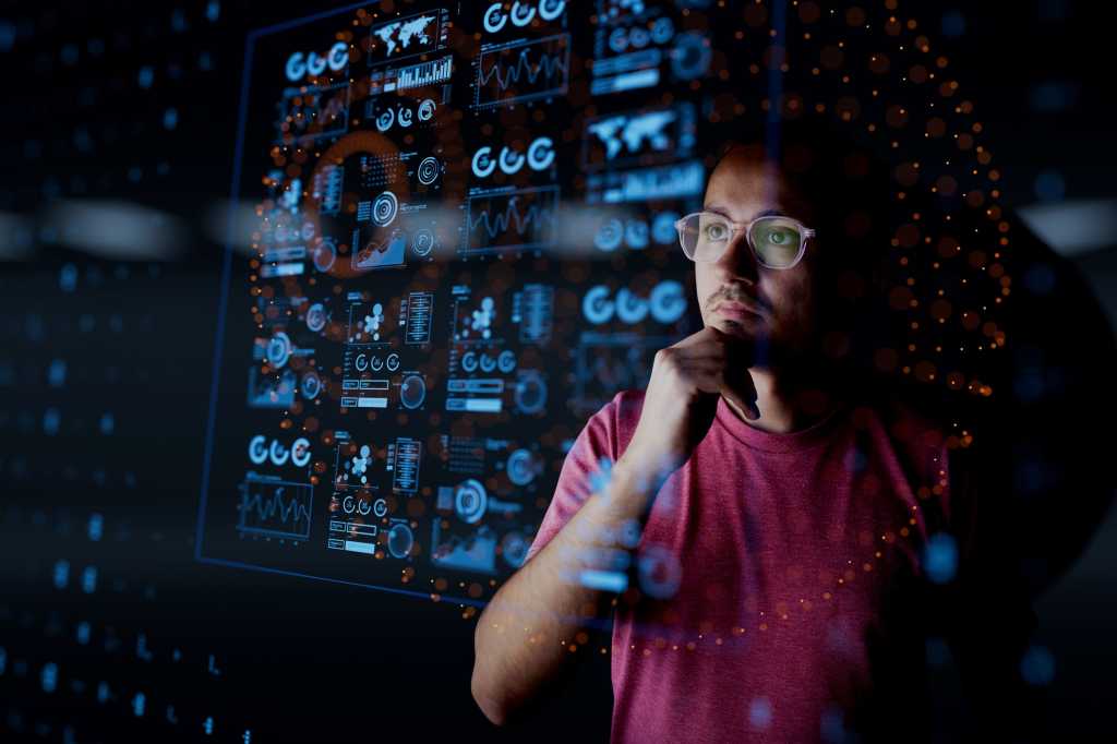man contemplating data