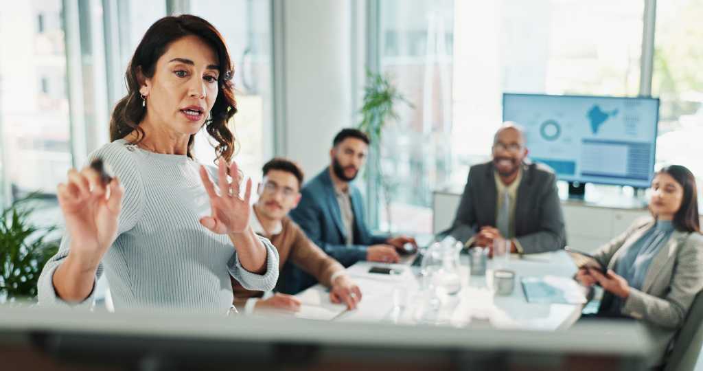 Manager, businesswoman and whiteboard for presentation, training and coaching for investment in company. Team, leader and workshop meeting for learning, proposal and brainstorming ideas for finance