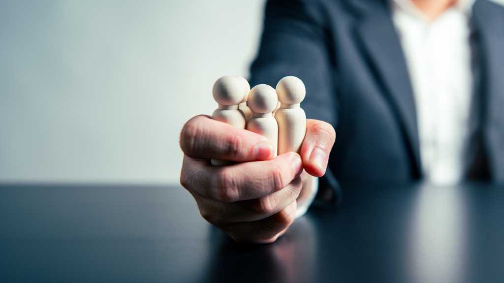 CEO Influence Business Agreements and Employee Dismissals workforce labor businessman hand background. Tyrant and corruption concept. 2325646331 squeeze