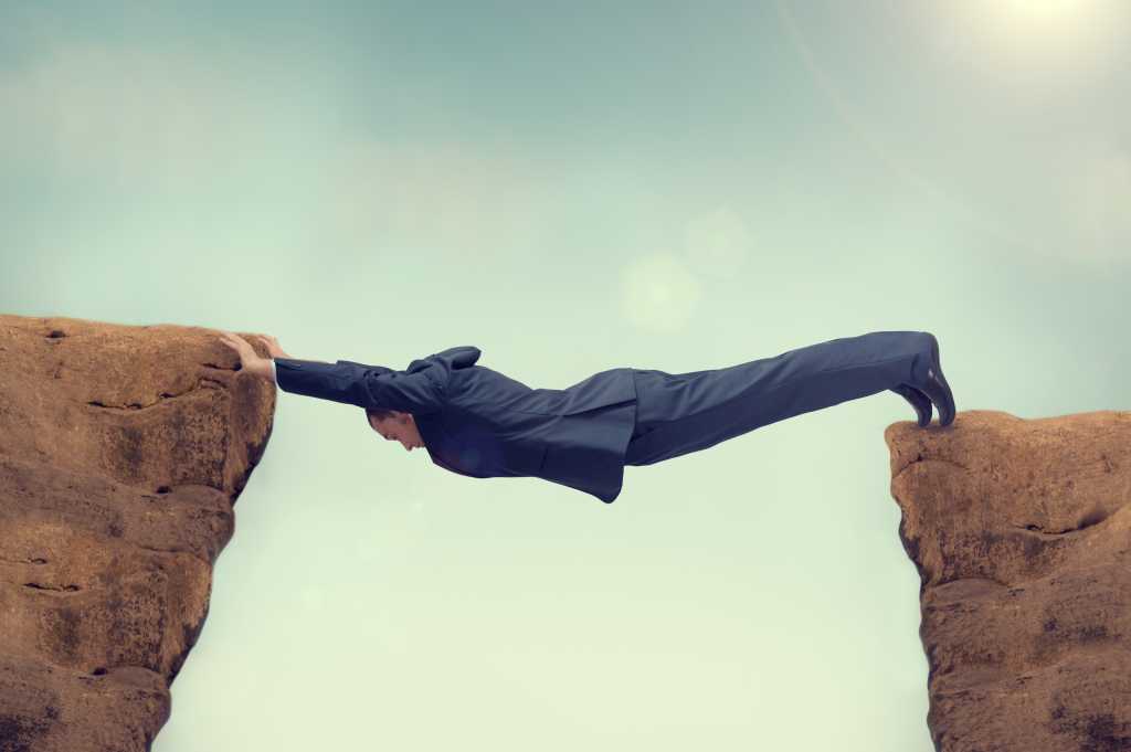 businessman bridges gap